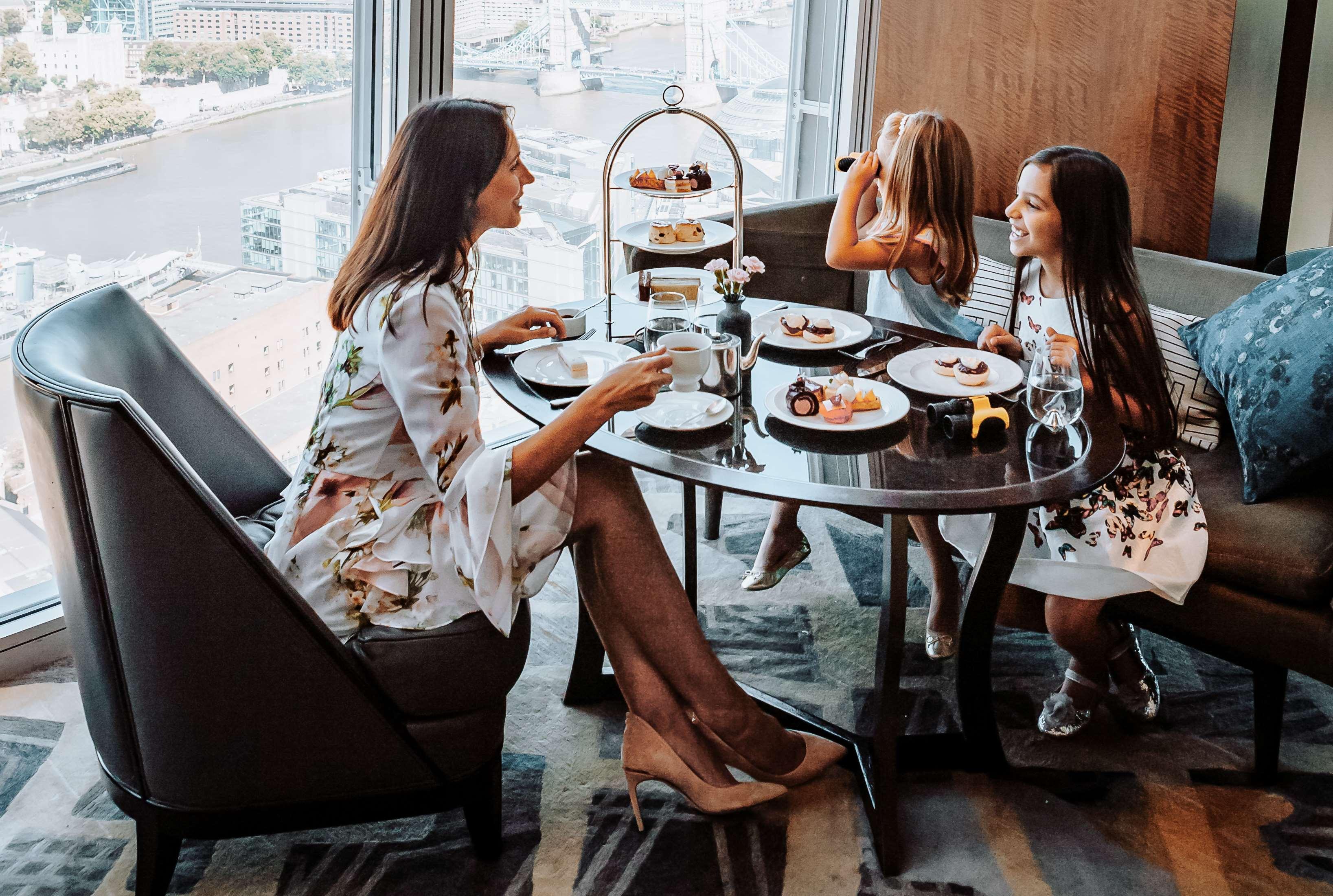 Shangri-La The Shard, London Exterior photo Afternoon tea at the Ritz-Carlton, DIFC, Dubai